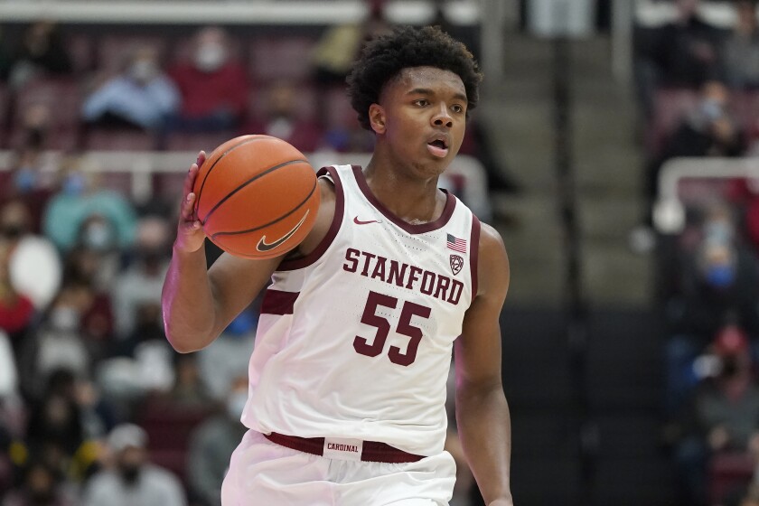 Stanford forward Harrison Ingram (55) dribbles up the court against Oregon during the second half of an NCAA college basketball game in Stanford, Calif., Sunday, Dec. 12, 2021. (AP Photo/Jeff Chiu)