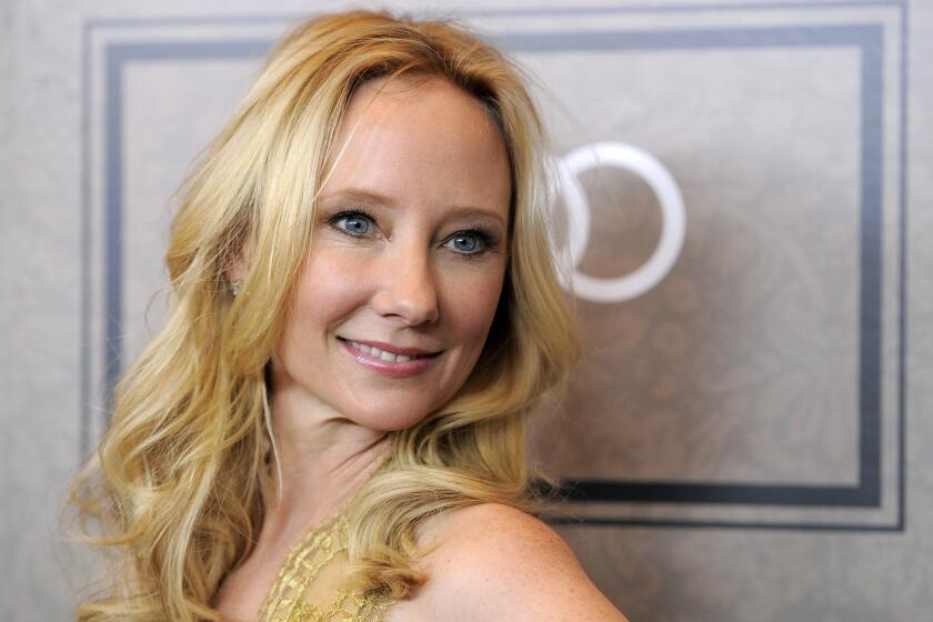 FILE - Actor Anne Heche poses at Variety's 4th annual Power of Women event in Beverly Hills, Calif., on Oct. 5, 2012. A spokesperson for Heche says the actor is on life support after suffering a brain injury in a fiery crash a week ago and isn't expected to survive. The statement released on behalf of her family said she is being kept on life support to determine if she is a viable organ donor. (Photo by Chris Pizzello/Invision/AP, File)