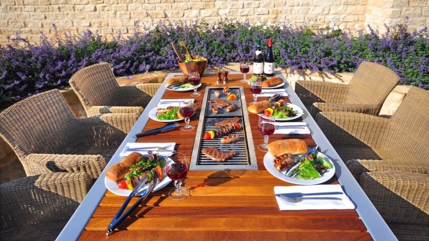 IBBQ's outdoor grill and dining table brings families together over a meal.