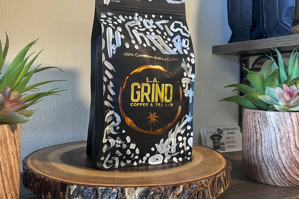 A hand-painted bag of whole coffee beans from L.A. Grind