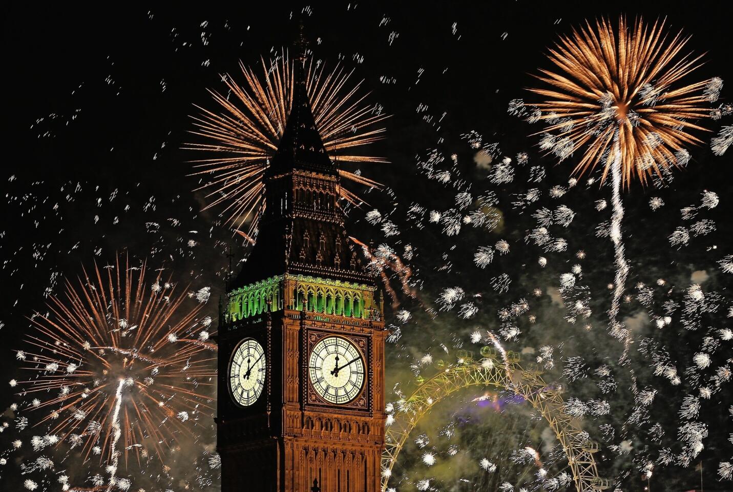 Fireworks light up the London skyline and Big Ben just after midnight. Thousands of people lined the banks of the River Thames in central London to ring in the new year with a spectacular fireworks display.