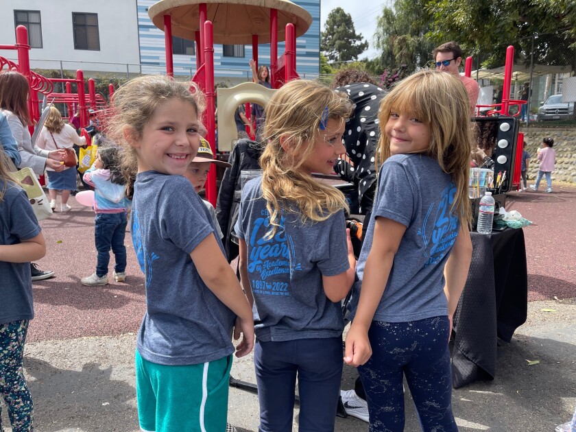 La Jolla Elementary students wear their 125th-anniversary shirts at a May 1 celebration at the La Jolla Open Aire Market.