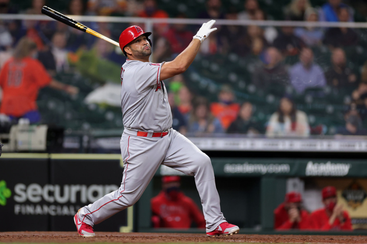 Angels first baseman Albert Pujols hits against the Astros.