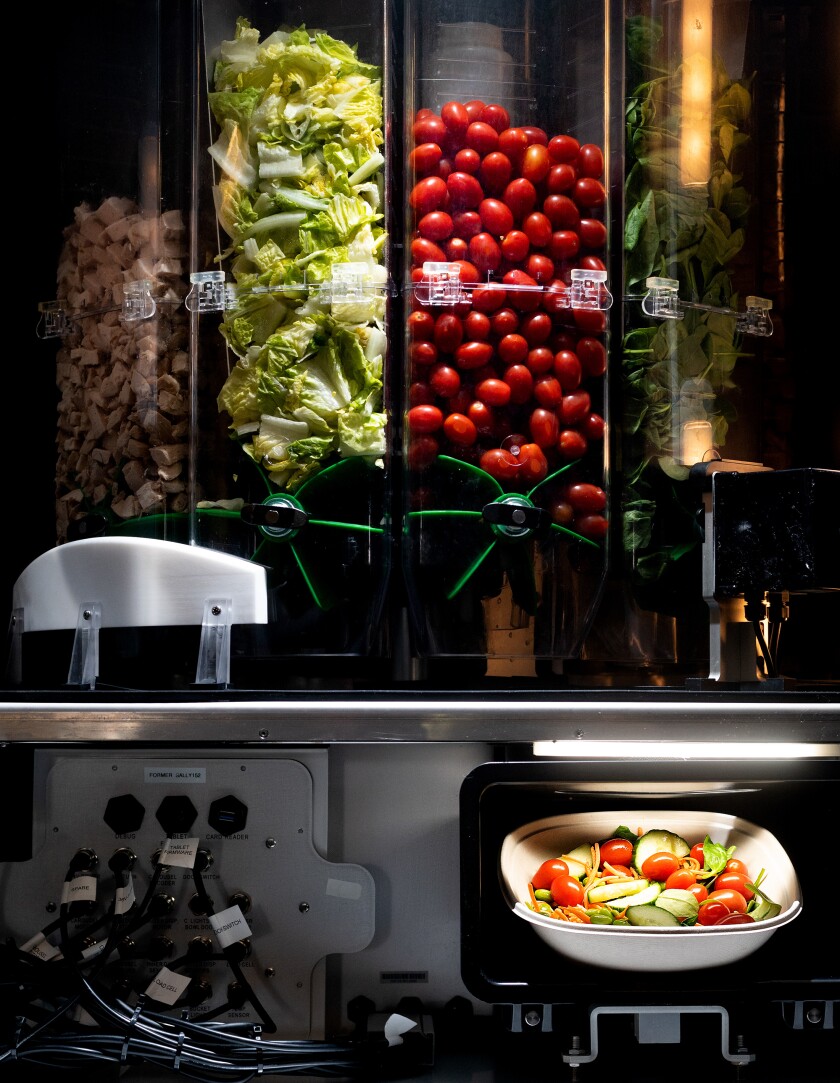 A salad dispenser by Chowbotics, called Sally 