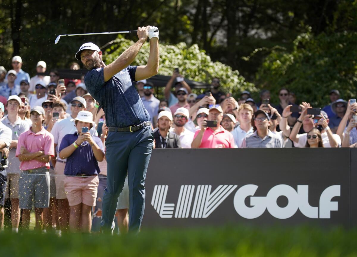 Dustin Johnson hits off the second tee during the final round of the LIV Golf Invitational-Boston on Sunday.