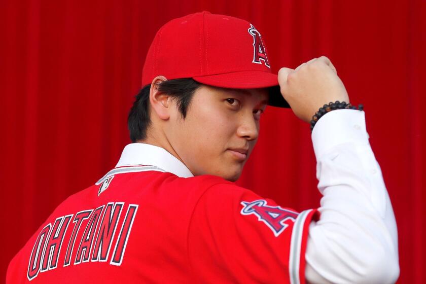 ANAHEIM, CALIF. -- SATURDAY, DECEMBER 9, 2017 The Angels announce that they have signed Japanese superstar Shohei Ohtani, who is a pitcher and a power hitter, during a press conference at Angel Stadium in Anaheim, Calif., on Dec. 9, 2017. (Allen J. Schaben / Los Angeles Times)
