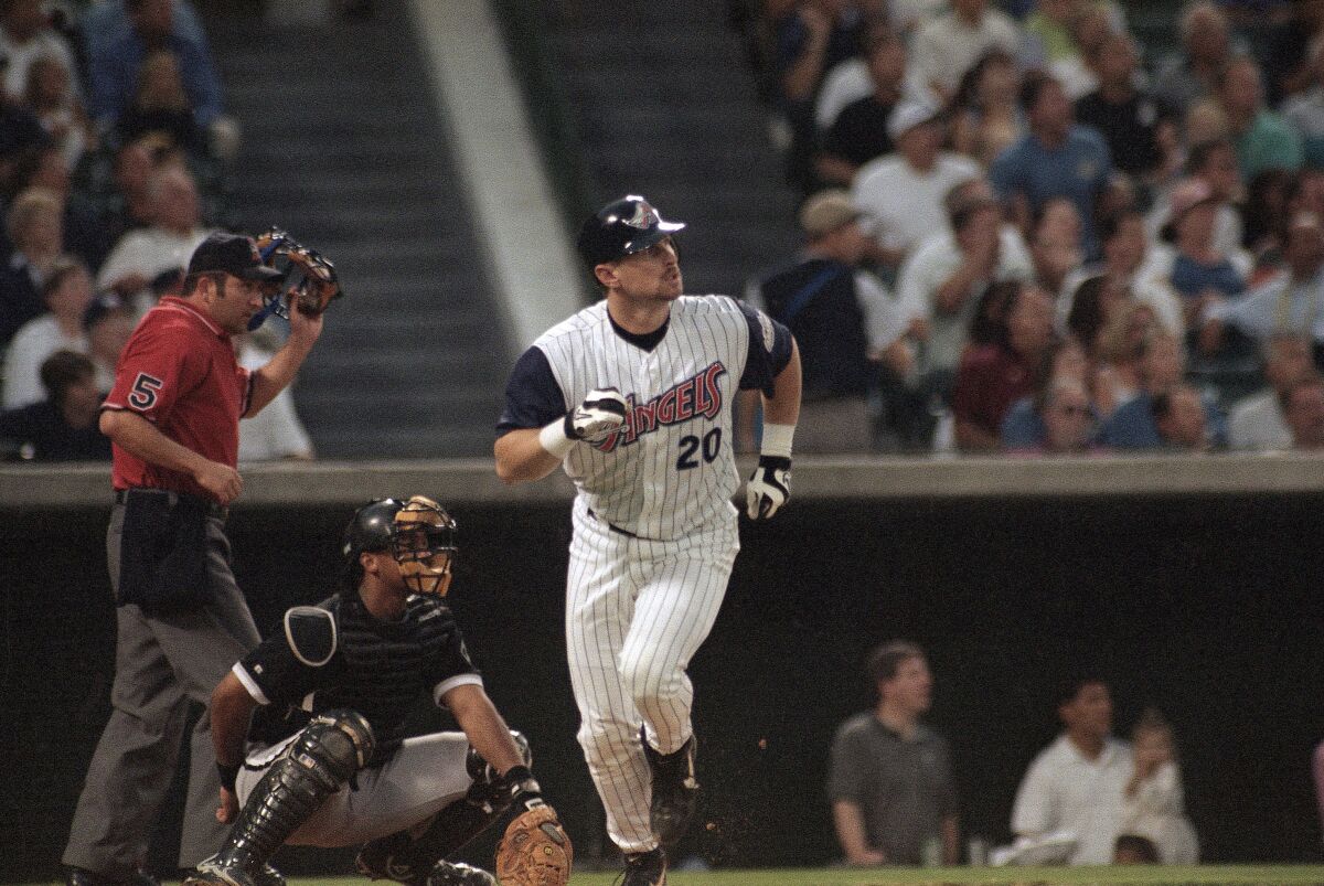 The Angels' Phil Nevin rounds the bases after hitting a two-run home run Aug. 17, 1998, against the White Sox.