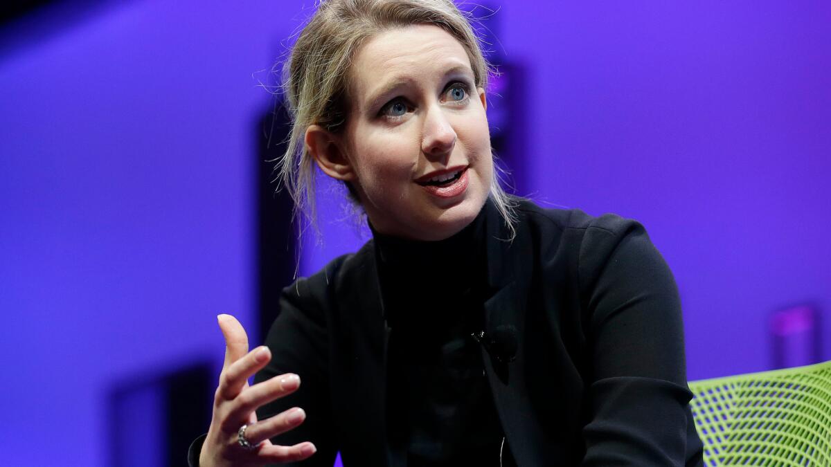 Theranos founder Elizabeth Holmes, shown in November, has been banned from owning or operating a medical laboratory for two years.