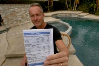LOS ANGELES, CALIF. - FEB. 6, 2023. Long Beach resident Brent Eldridge, 48, received a $907.13 gas bill in January. He suspects it was from running his jacuzzi. (Luis Sinco / Los Angeles Times)
