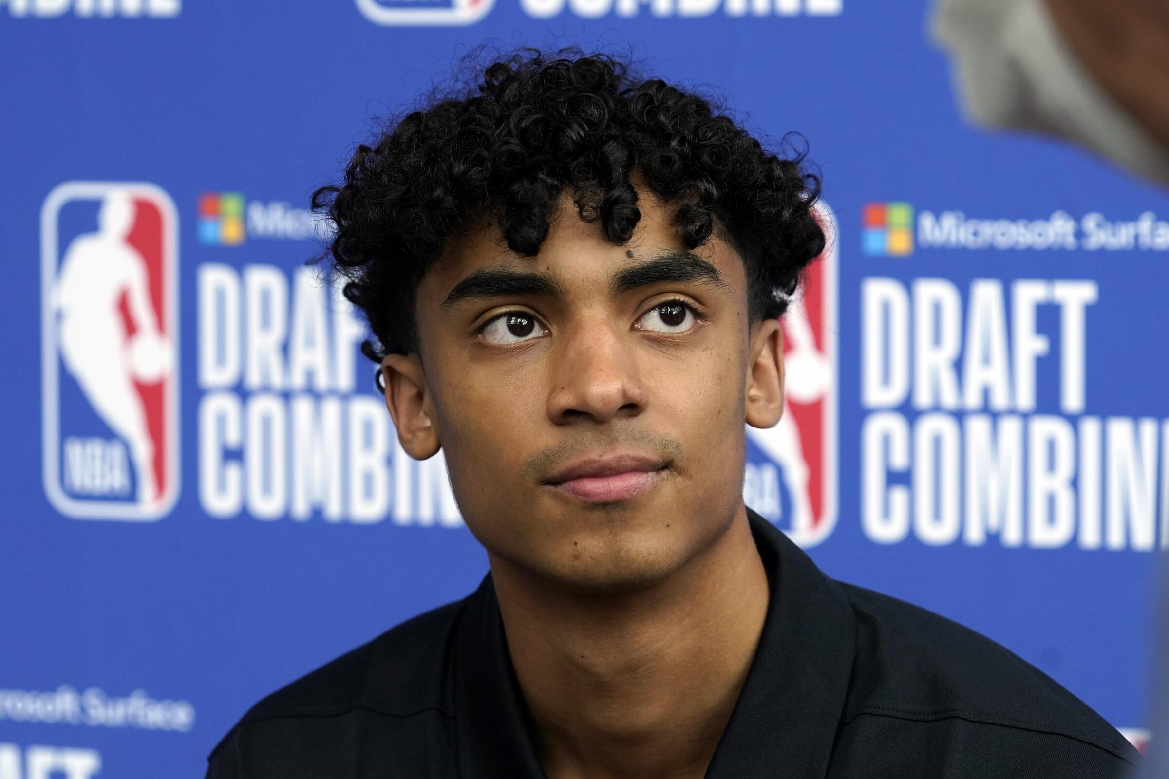 Max Christie talks with reporters during the NBA draft combine in May.