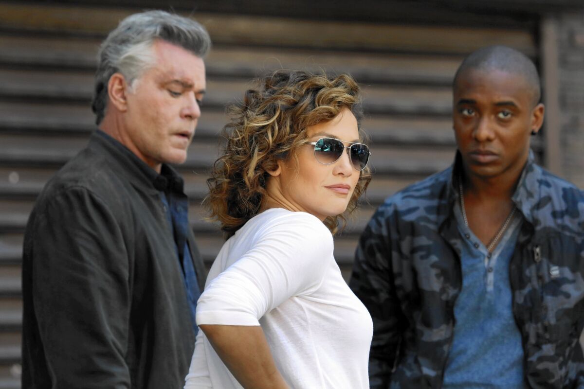 Actors Ray Liotta, left, Jennifer Lopez and Hampton Fluker on the set of "Shades of Blue."