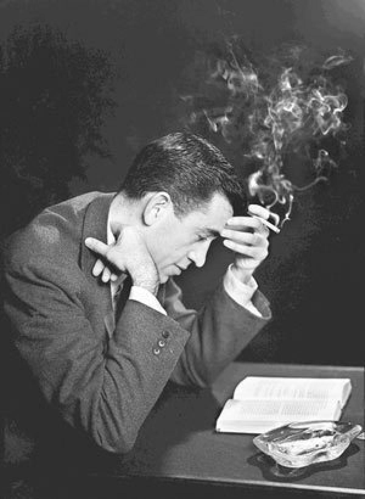 Author JD Salinger reads from his novel "The Catcher in the Rye" on Nov. 20, 1952, in Brooklyn, NY.