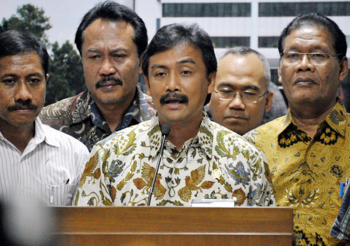 Youth and Sports Minister Andi Alfian Mallarangeng announces his resignation during a news conference in Jakarta, Indonesia. Mallarangeng formerly served as the president's spokesman.