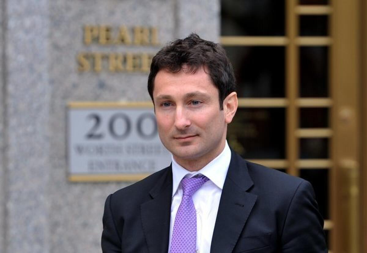 Former Goldman Sachs trader Fabrice Tourre leaves for a lunch break from federal court in New York.