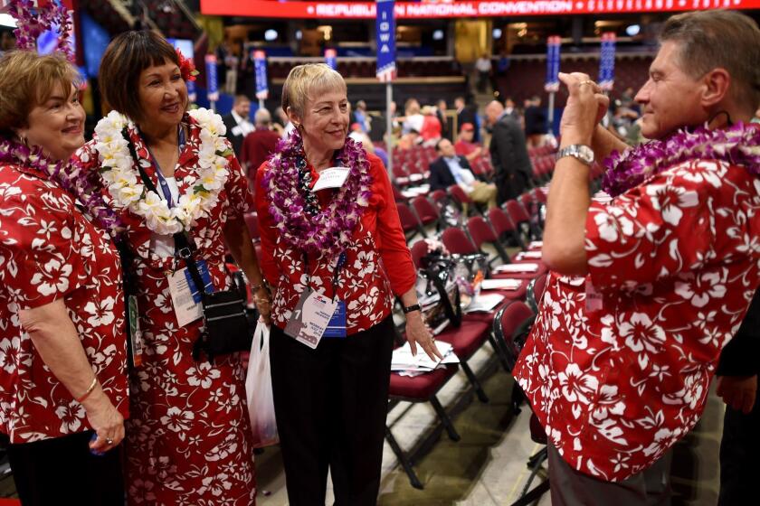 Hawaii delegates gather on the first day of the Republican National Convention on July 18, 2016 at the Quicken Loans Arena in Cleveland, Ohio. The Republican Party opened its national convention Monday, kicking off a four-day political jamboree that will anoint billionaire Donald Trump as the Republican presidential nominee. / AFP / TIMOTHY A. CLARY (Photo credit should read TIMOTHY A. CLARY/AFP/Getty Images) ** OUTS - ELSENT, FPG, CM - OUTS * NM, PH, VA if sourced by CT, LA or MoD **