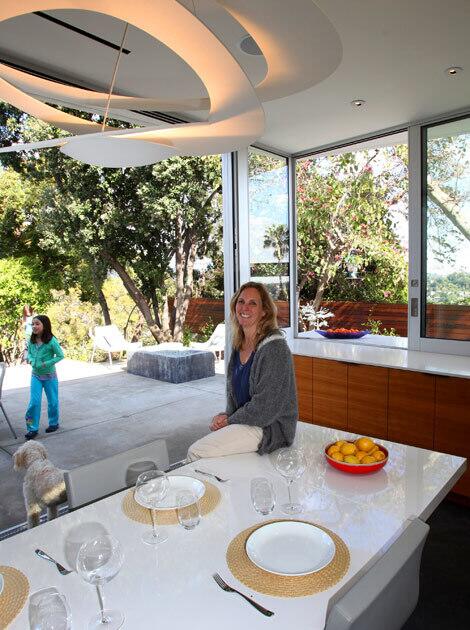 By Lisa Boone When Melissa Cobb set out to build a new kitchen, she wanted the Los Angeles house — built in 1939 and traditional in style — to feel updated in a subtly modern way. "It's always so interesting to blend modern and traditional," said Cobb, a producer at DreamWorks whose credits include "Kung Fu Panda" and its forthcoming sequel. With the help of architect Alice Kimm of Los Angeles-based John Friedman Alice Kimm Architects, Cobb does have her new kitchen, outdoor patio and adjacent bathroom-laundry room. Keep reading for a look at the remodel's features …