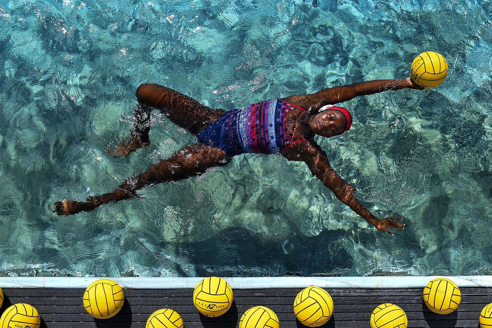 Goalkeeper Ashleigh Johnson, one of only a few non-Californians on the U.S. women's water polo program, has won world championships and Olympic gold medals with the team. Photographed at the Joint Forces Training Base in Los Alamitos, Ca.