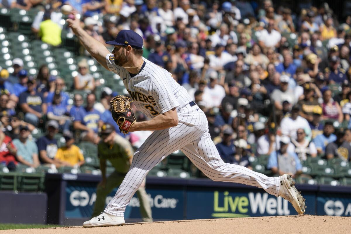 Brewers' Adrian Houser leaves game with elbow soreness