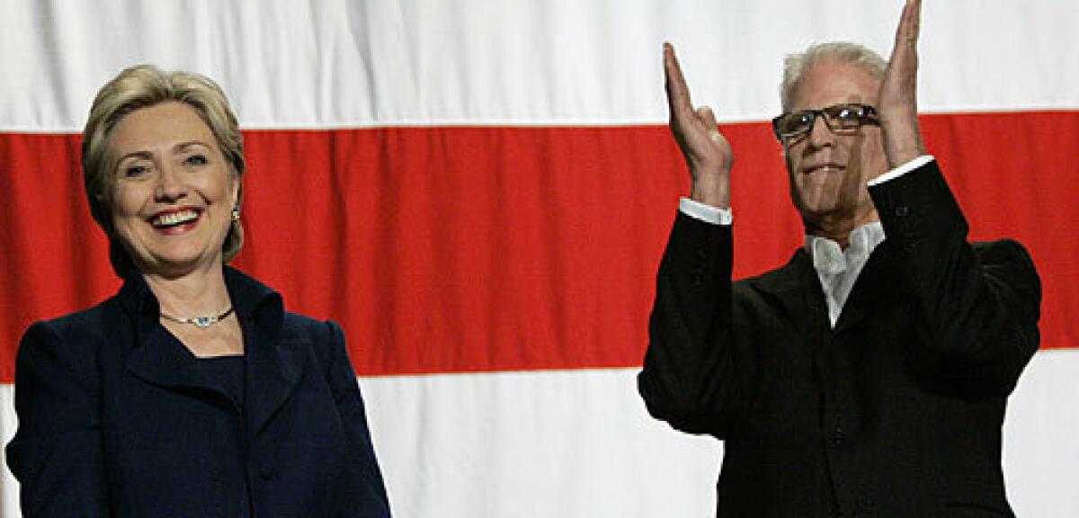 Ted Danson applauds Sen. Hillary Rodham Clinton at a San Francisco fundraiser.
