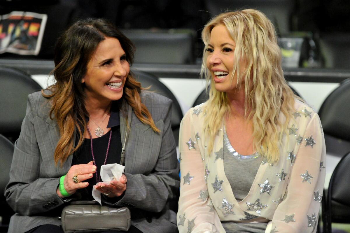 Linda Rambis (L) and Jeanie Buss attend a basketball game between the Los Angeles Lakers and the Sacramento Kings at Staples Center on March 24, 2019 in Los Angeles, California.