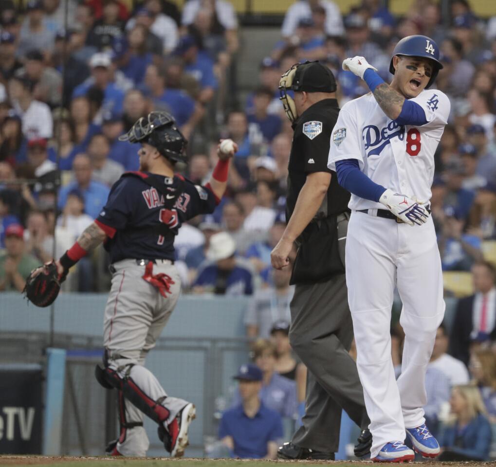 Dodgers Manny Machado reacts after striking out in the first inning.