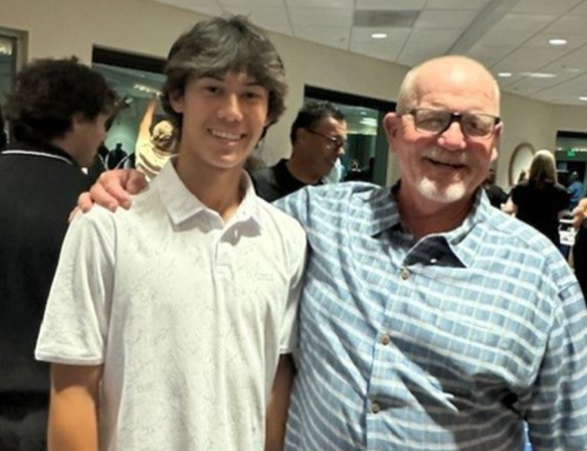 Norco coach Gary Parcell, right, and freshman baseball player Dylan Seward.