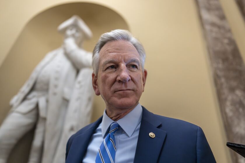 Sen. Tommy Tuberville, R-Ala., a member of the Senate Armed Services Committee, talks to reporters as he faces backlash for remarks he made about white nationalists in an interview about his blockade of military nominees, at the Capitol in Washington, Tuesday, May 16, 2023. Tuberville continues to hold up a slew of military appointments over his opposition to Pentagon abortion policies, which provide travel funds and support for troops and dependents who seek abortions but are based in states where they are now illegal. (AP Photo/J. Scott Applewhite)