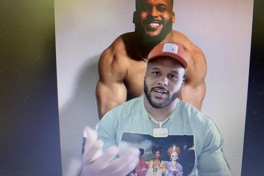 During his zoom conference call with reporters, Rams defensive tackle Aaron Donald used a photo of himself flexing as his background.