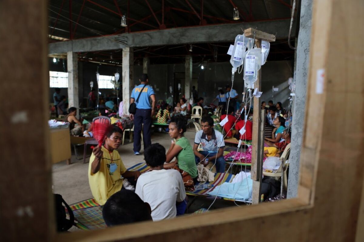 Patients in a hospital in the Philippines after an outbreak of the intestinal illness cholera.