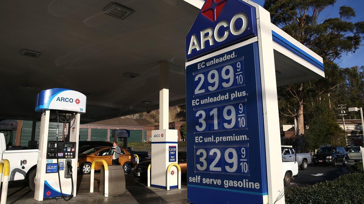 Gas prices are displayed at an Arco gas station in Mill Valley, Calif., in October 2014.