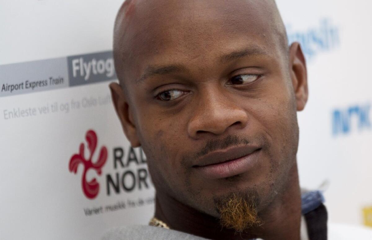 Italian police raided the hotel where Asafa Powell, shown, and fellow Jamaican sprinter Sherone Simpson were staying.