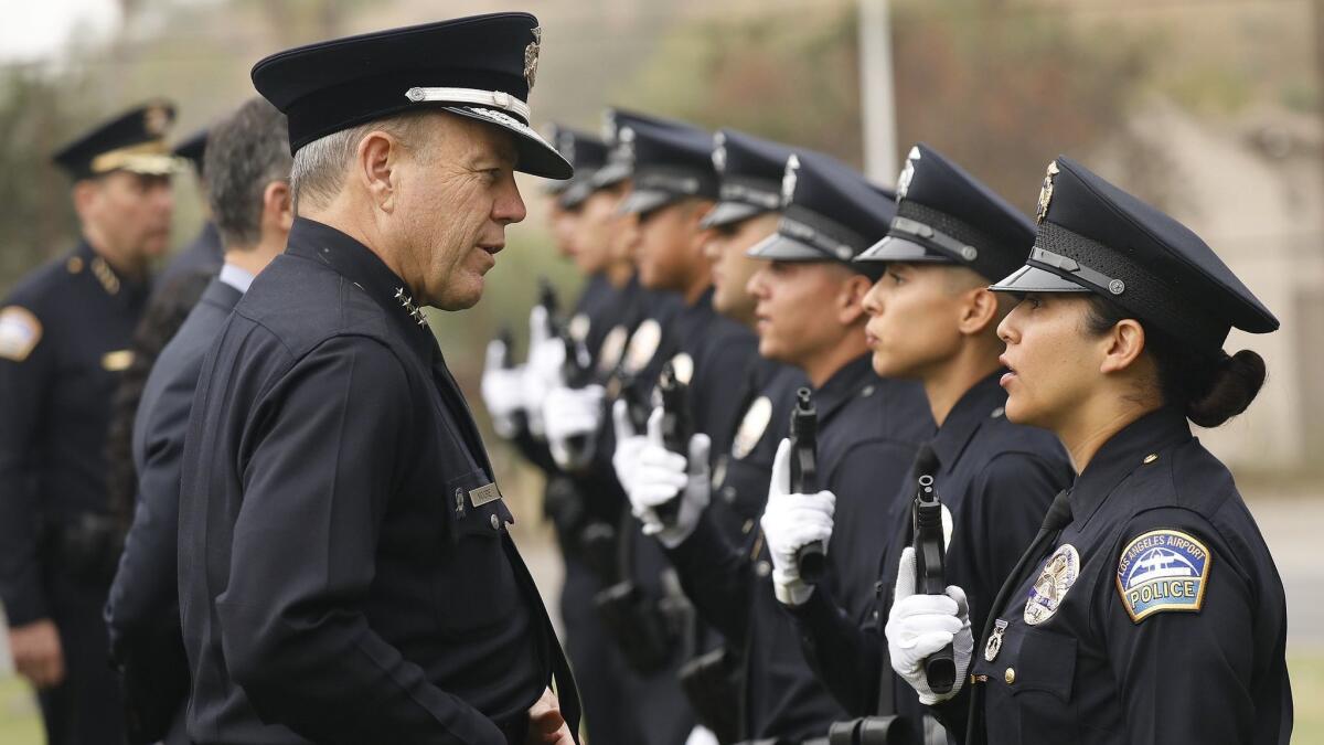 Police Chief Michel Moore talks to recruits during uniform inspection at the Los Angeles Police Department graduation exercises in April 2018.