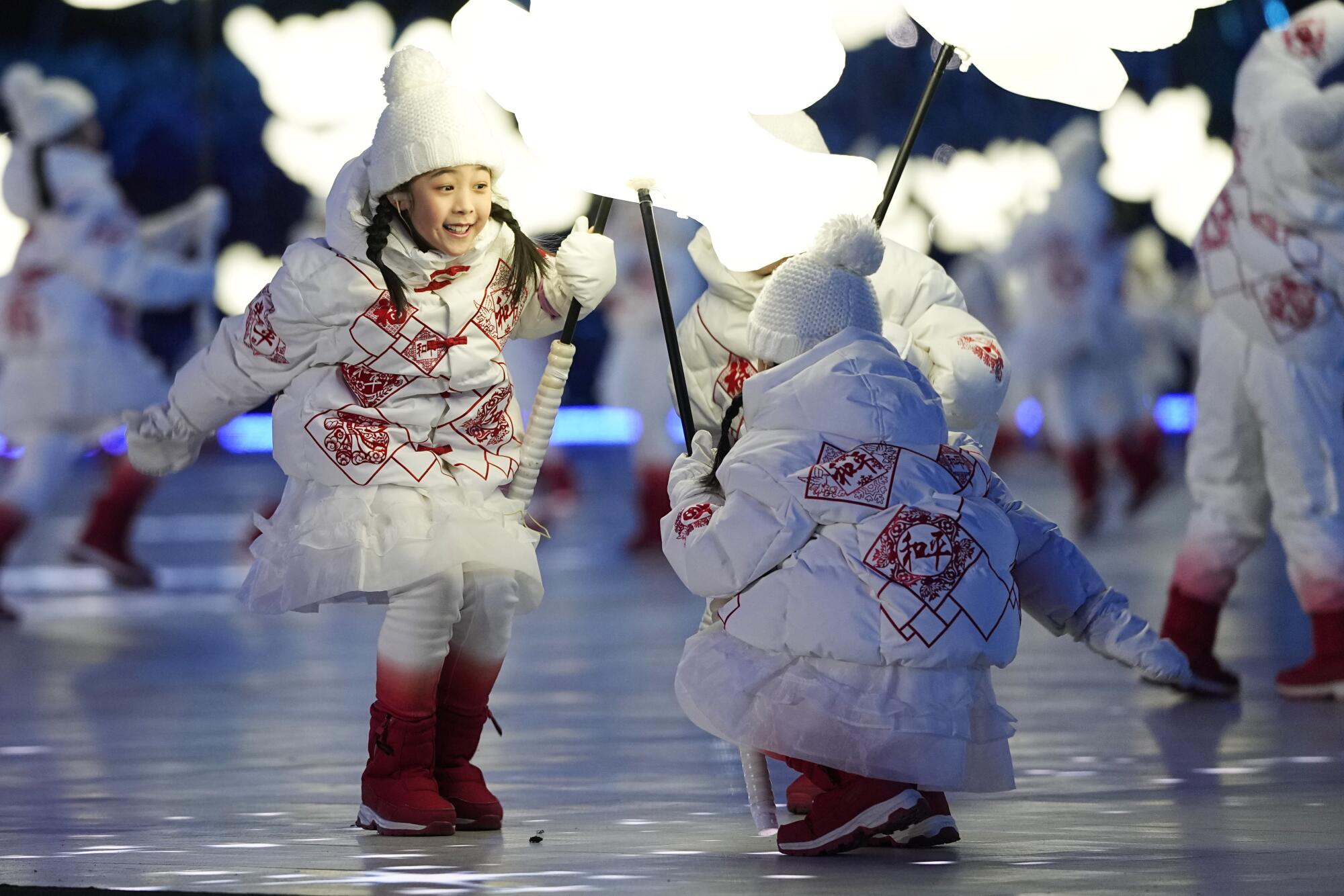 Hundreds of children perform in a segment called "The Snowflake."