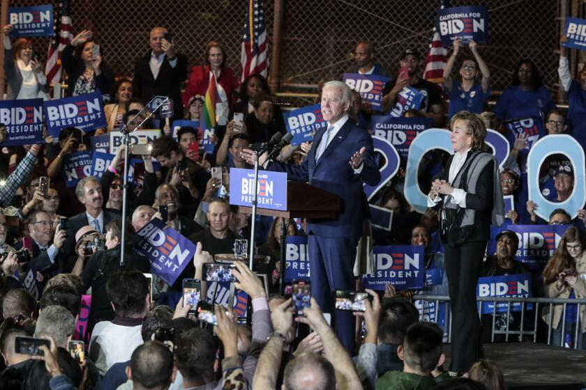 LOS ANGELES, CA, TUESDAY, MARCH 3, 2020 - Democratic Presidential hopeful Joe Biden on stage with his wife, Jill and sister, Valerie, far right at the Baldwin Hills Recreation Center. (Robert Gauthier/Los Angeles Times)