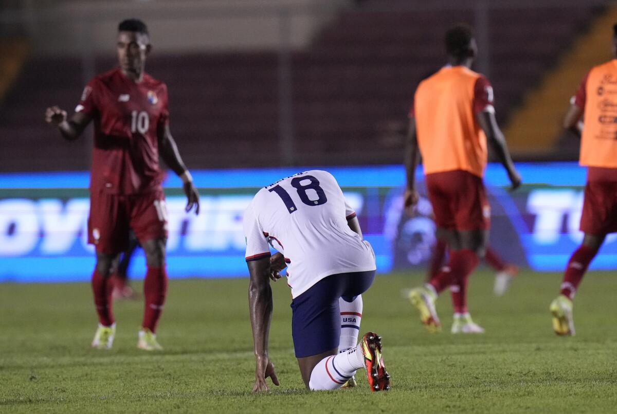 United State's Mark McKenzie, center, reacts a