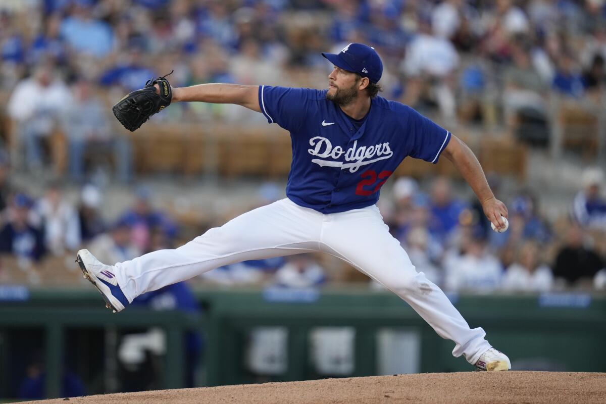 Dodgers starting pitcher Clayton Kershaw delivers against the Texas Rangers on March 16.