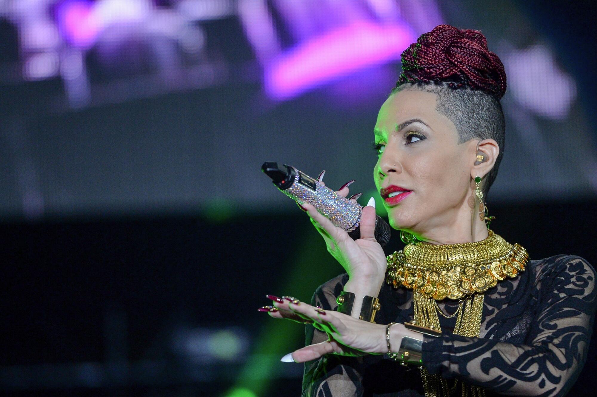 Ivy Queen on stage in 2015