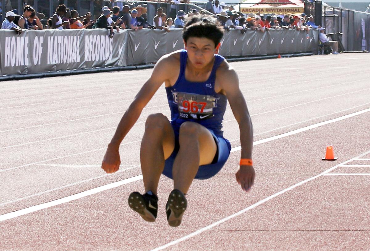 Fountain Valley's Jonathan Yu in the boys' triple jump competition of the Arcadia Invitational on Saturday.