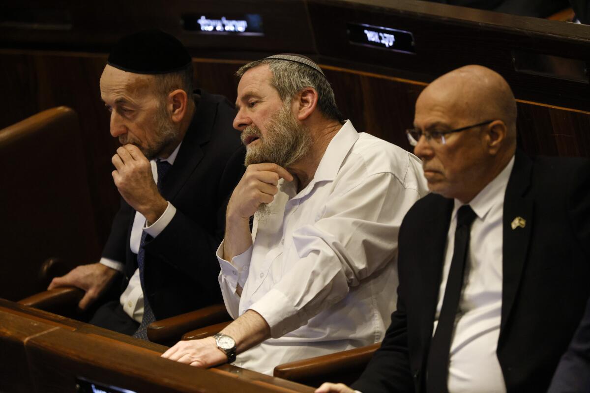 Israeli lawmakers in parliament