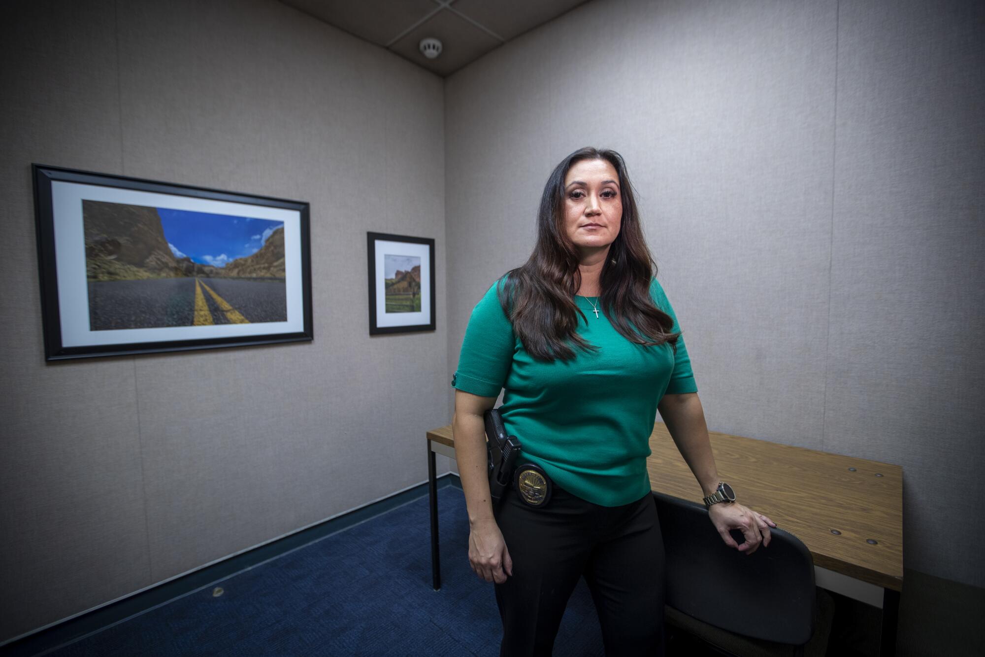  Detective Julissa Trapp stands in the interrogation room