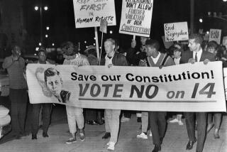 Demonstrators march north on Broadway toward the City Hall where the Congress of Racial Equality (CORE) and other groups protested the passage of Proposition 14, repealing the Rumford Fair Housing Act in 11/3 election. More than 300 took part in the demonstration. (Photo by Bettmann Archive/Getty Images)