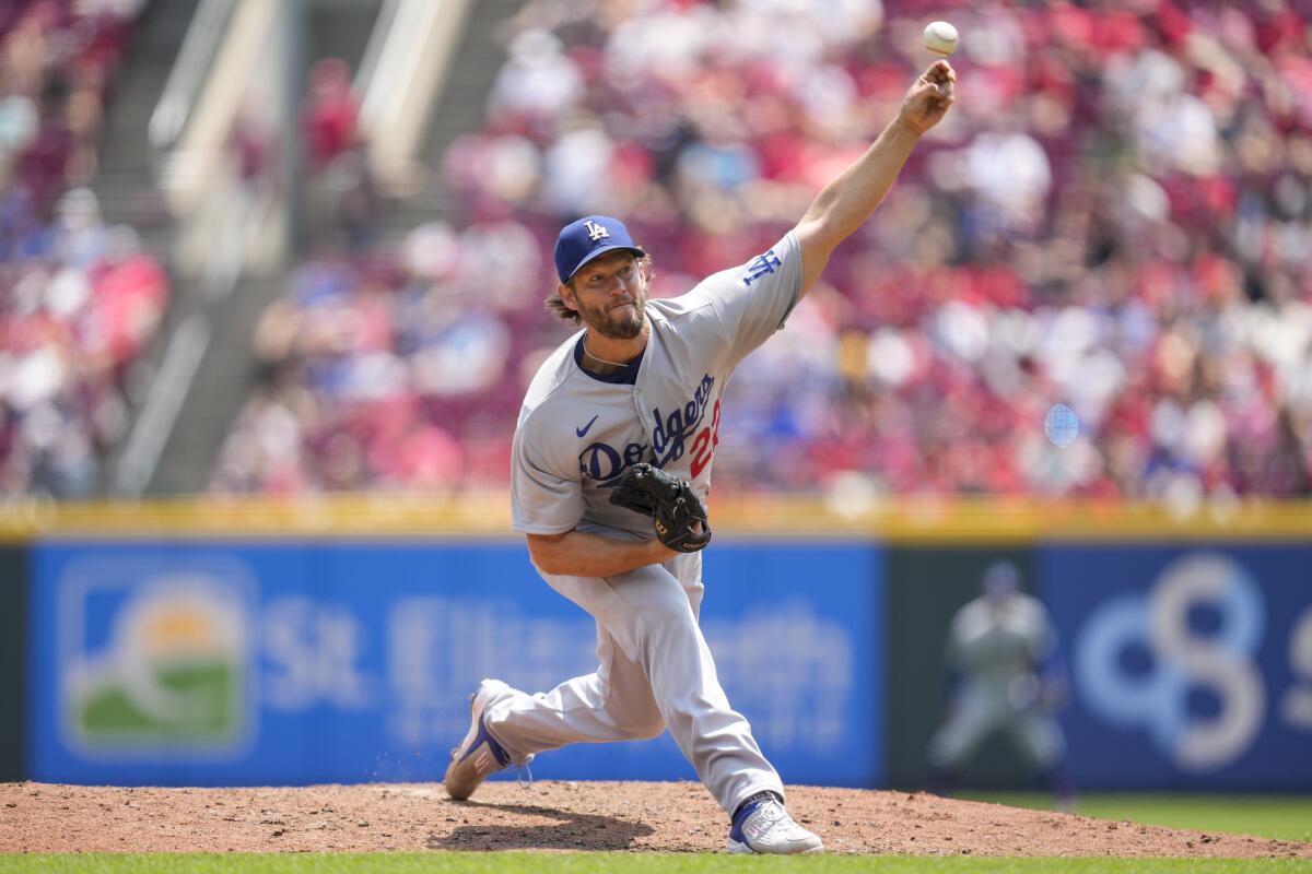 Dodgers starting pitcher Clayton Kershaw delivers during the fifth inning of a 6-0 win over the Cincinnati Reds.