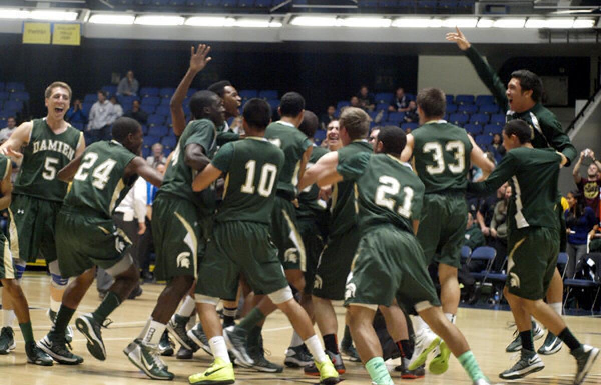 Damien players celebrate winning the Southern Section Division 3AA title on Thursday night in Anaheim.