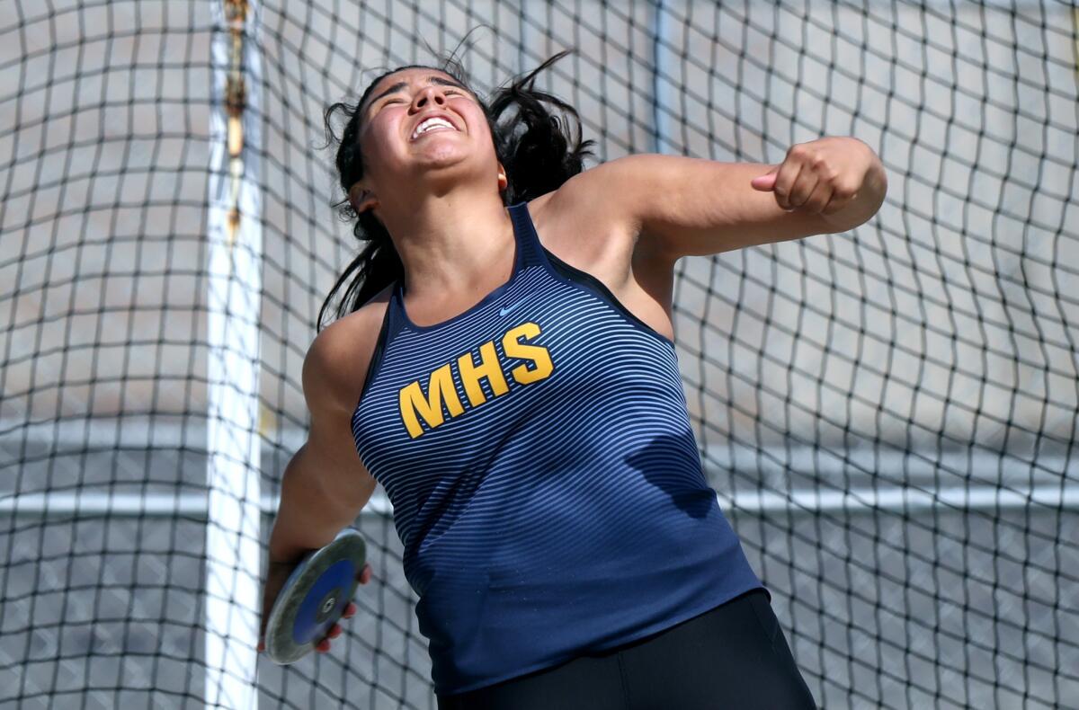 Marina High's Alejandra Rosales threw the discus 129 feet, 10 inches in the Beach Cities Invitational at Huntington Beach High on March 23.