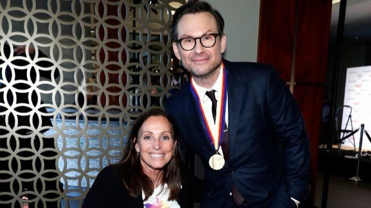 Paralympic athlete Candace Cable and actor Christian Slater attend Gold Meets Golden event.