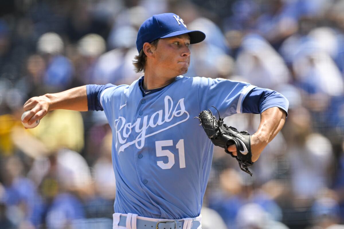 Kansas City Royals starting pitcher Brady Singer delivers during the first inning against the Dodgers on Sunday.