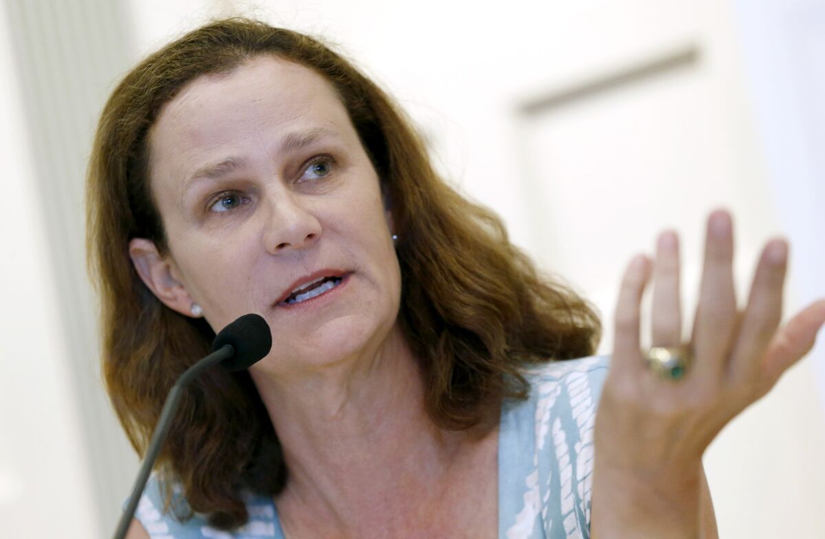FILE - Pam Shriver speaks during a news conference introducing the 2015 inductees to the International Tennis Hall of Fame in Newport, R.I., Saturday, July 18, 2015. Former professional tennis player Pam Shriver, now a television commentator for ESPN and the BBC, says that she “had an inappropriate and damaging relationship with my much older coach” that began when she was 17 and he was 50. In a first-person account published Wednesday, April 20, 2022, by British newspaper The Telegraph, Shriver describes a “painful and emotional journey” that included what she writes was a relationship with coach Don Candy that lasted a little more than five years. Candy died in 2020. (AP Photo/Michael Dwyer, File)