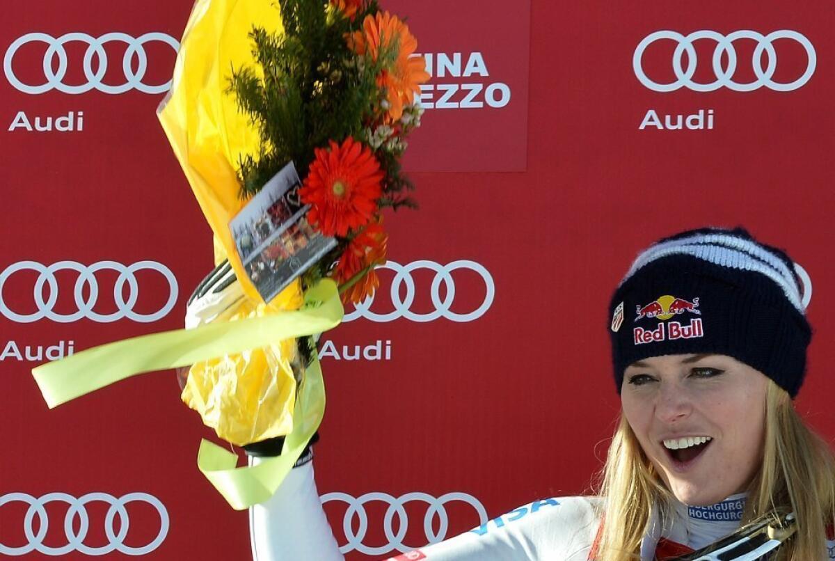Lindsey Vonn celebrates after winning a downhill race in January.