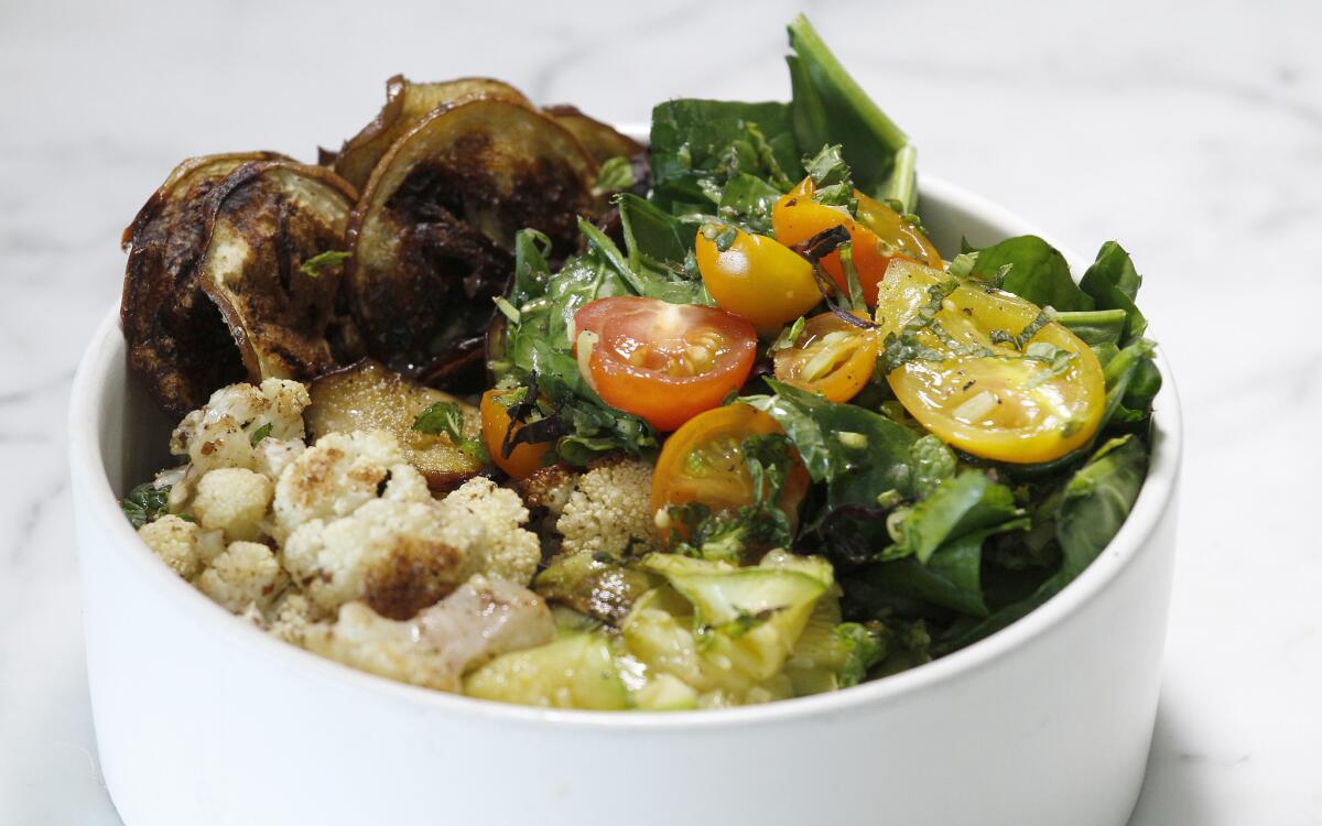 Rice bowl with cauliflower, zucchini and eggplant