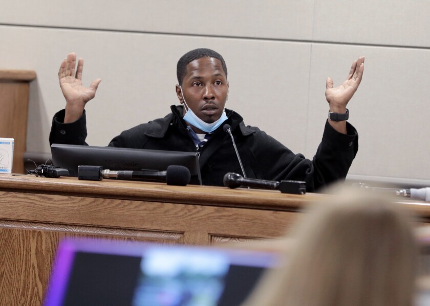 Travis Price testifies in the trial of Jonathan Moreno, a former Rock Hill police officer who was charged with misdemeanor assault and battery against Price in June of 2021, in Rock Hill, S.C., Monday, Jan. 24, 2022. (Tracy Kimball/The Herald via AP)